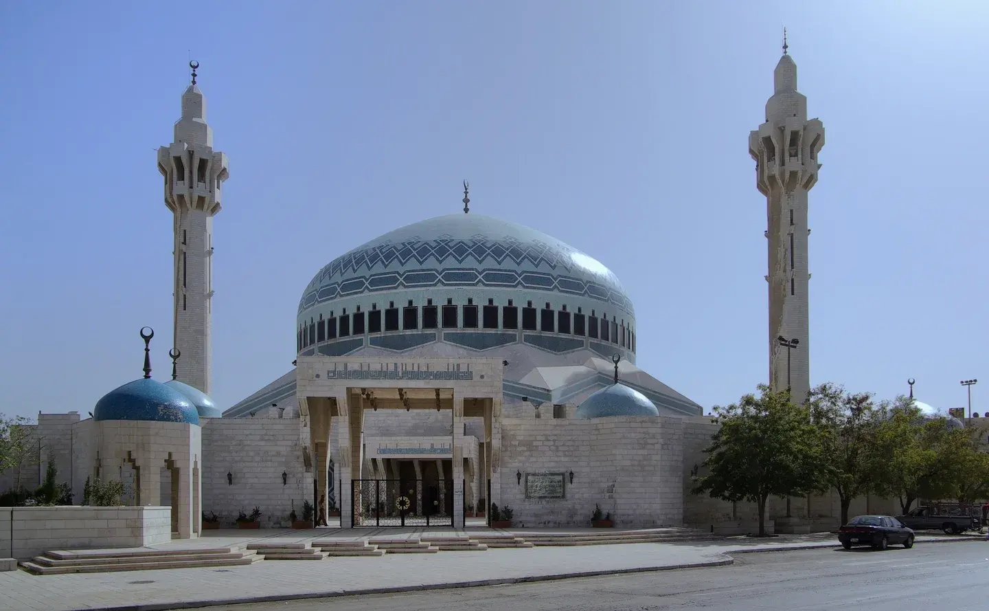 Blue dome and minarets of King Abdullah I Mosque in Amman