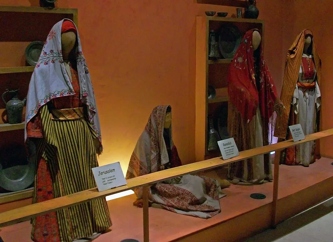 Traditional embroidered clothing displayed at the Jordan Museum of Popular Traditions